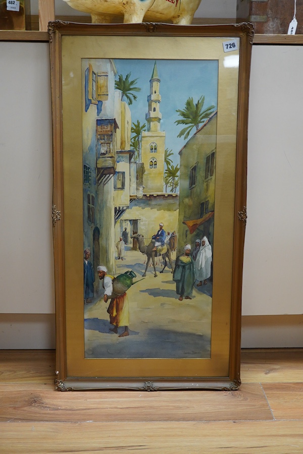 Giovanni Barbaro (1864-1915), Orientalist street scenes with figures and camels, each signed, four watercolours, largest 70 x 30cm